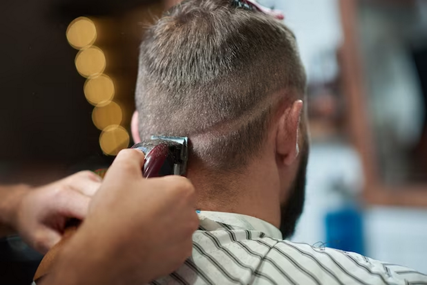 Man Getting Fade Haircuts at the Barbersho
