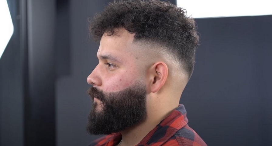 Man with High Fade Hairstyle and Curly Hair