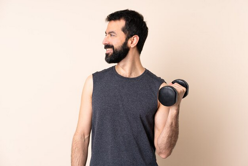 Man with beard holding weights